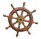 Isolated Vintage Wooden And Brass Ship's Steering Wheel With White Background